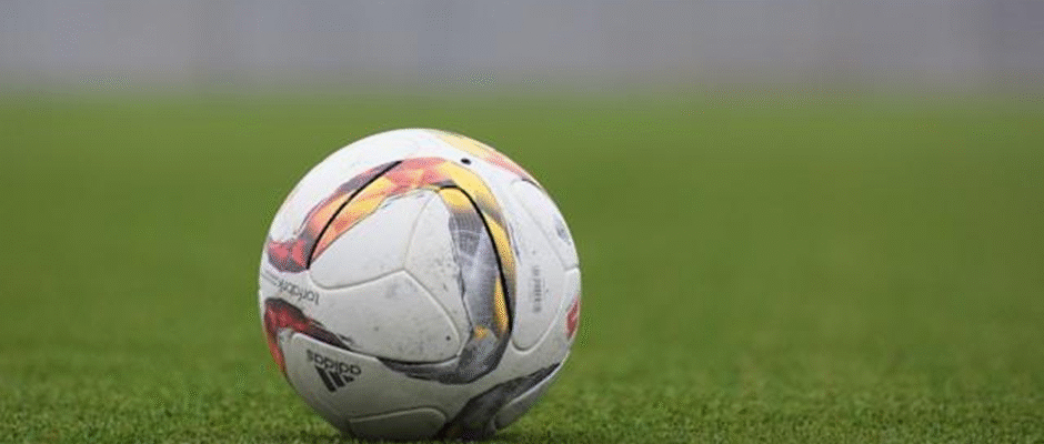 Soccer ball on a green grass